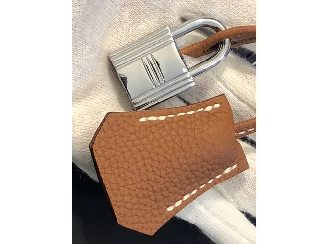 Hermès Clochette y taquilla 